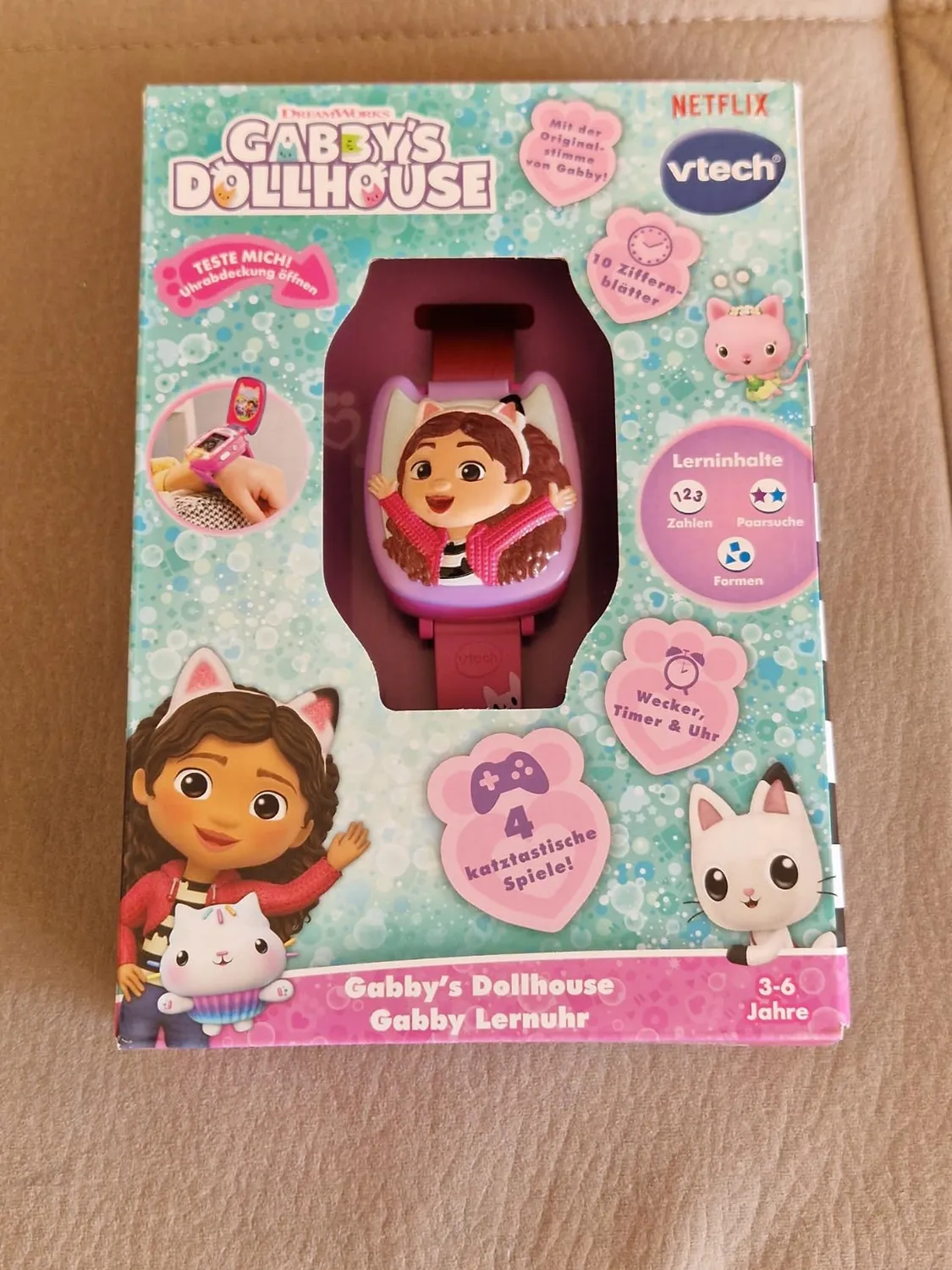 VTech Gabbys Dollhouse Lernuhr mit 4 Spielen und Stimme