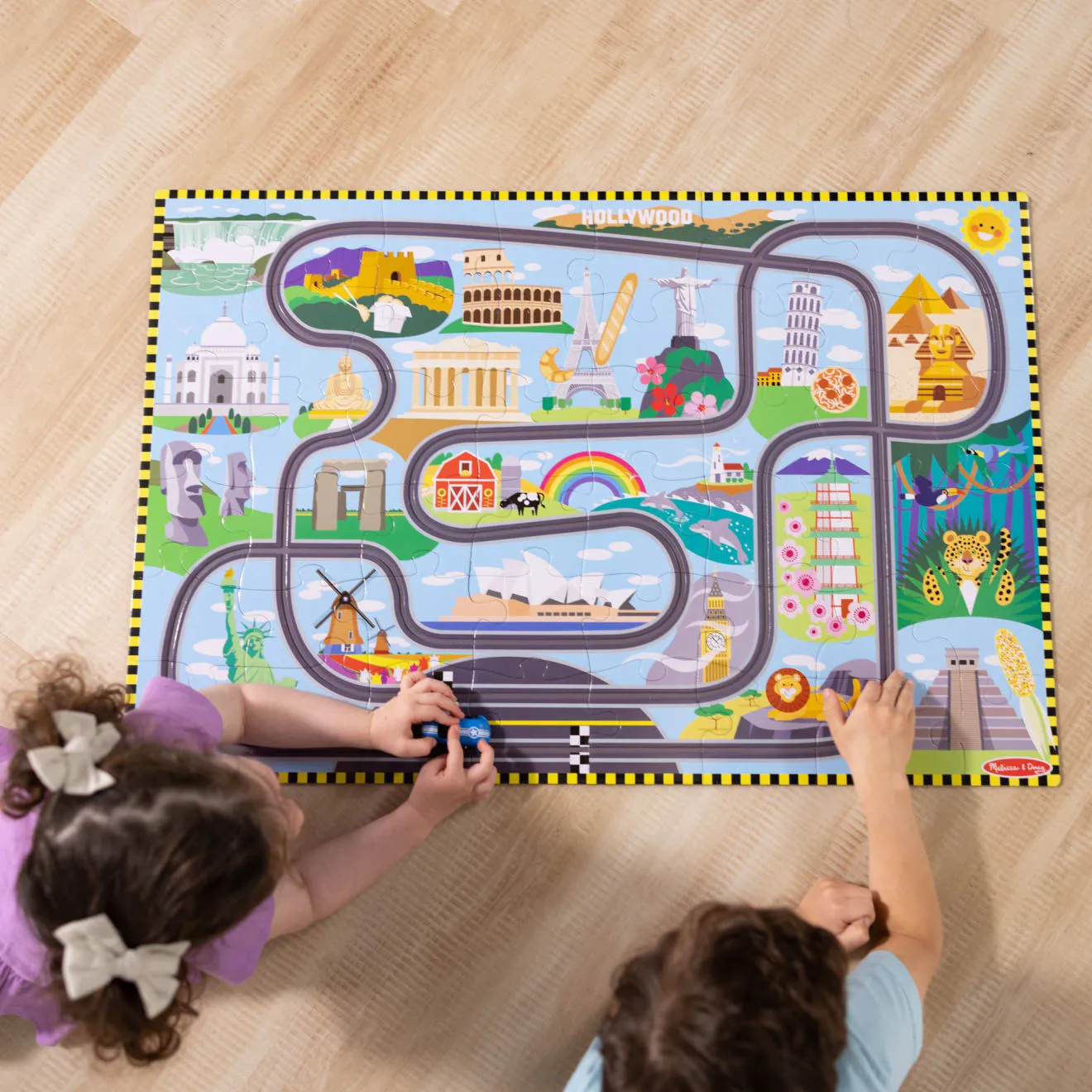 Melissa & Doug Race Around the World Bodenpuzzle 48 Teile Rennbahn