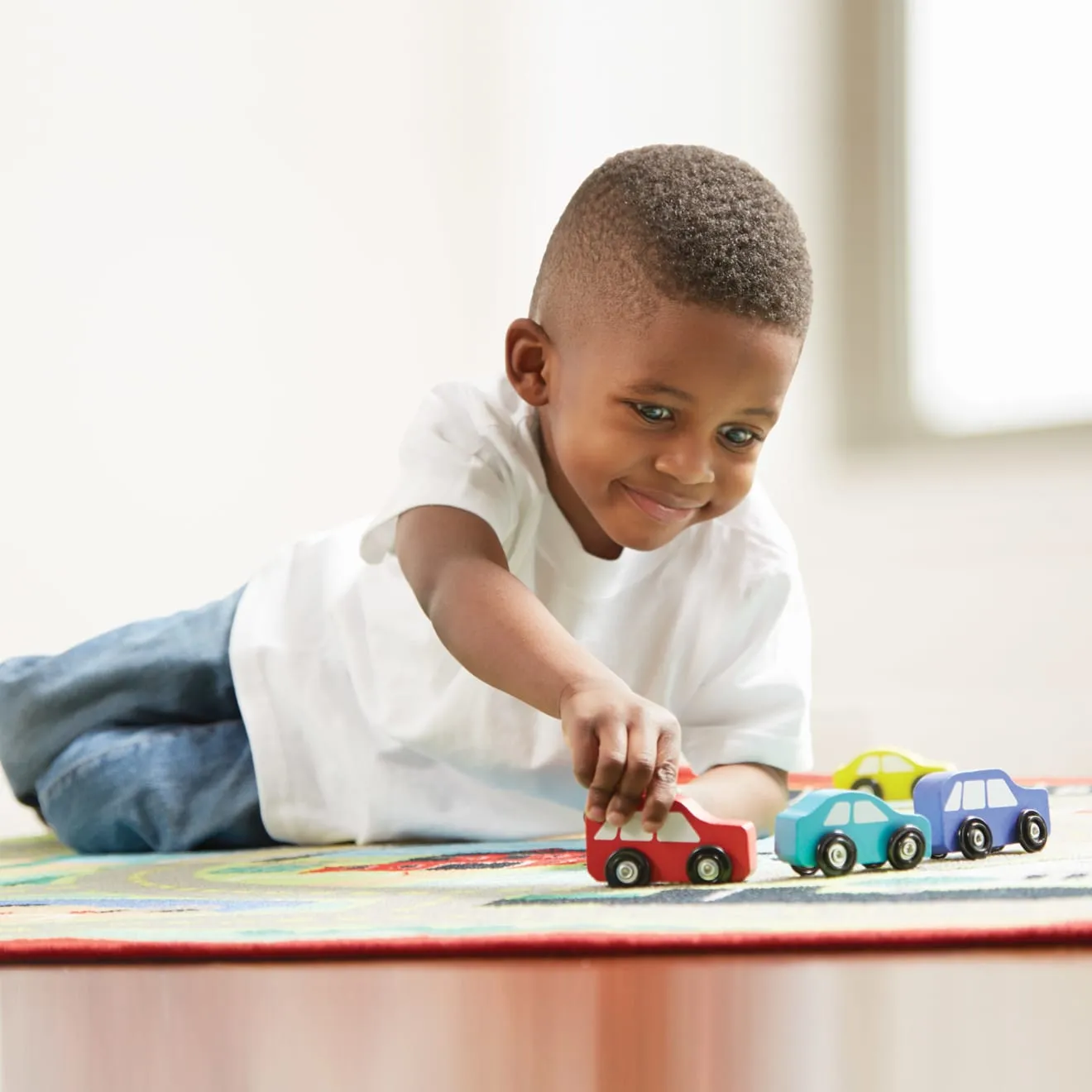 Melissa & Doug Round the Town Spielteppich mit 4 Autos