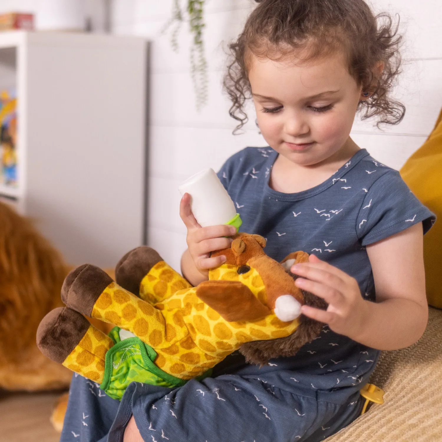 Melissa & Doug Baby Giraffe Kuscheltier mit Zubehör