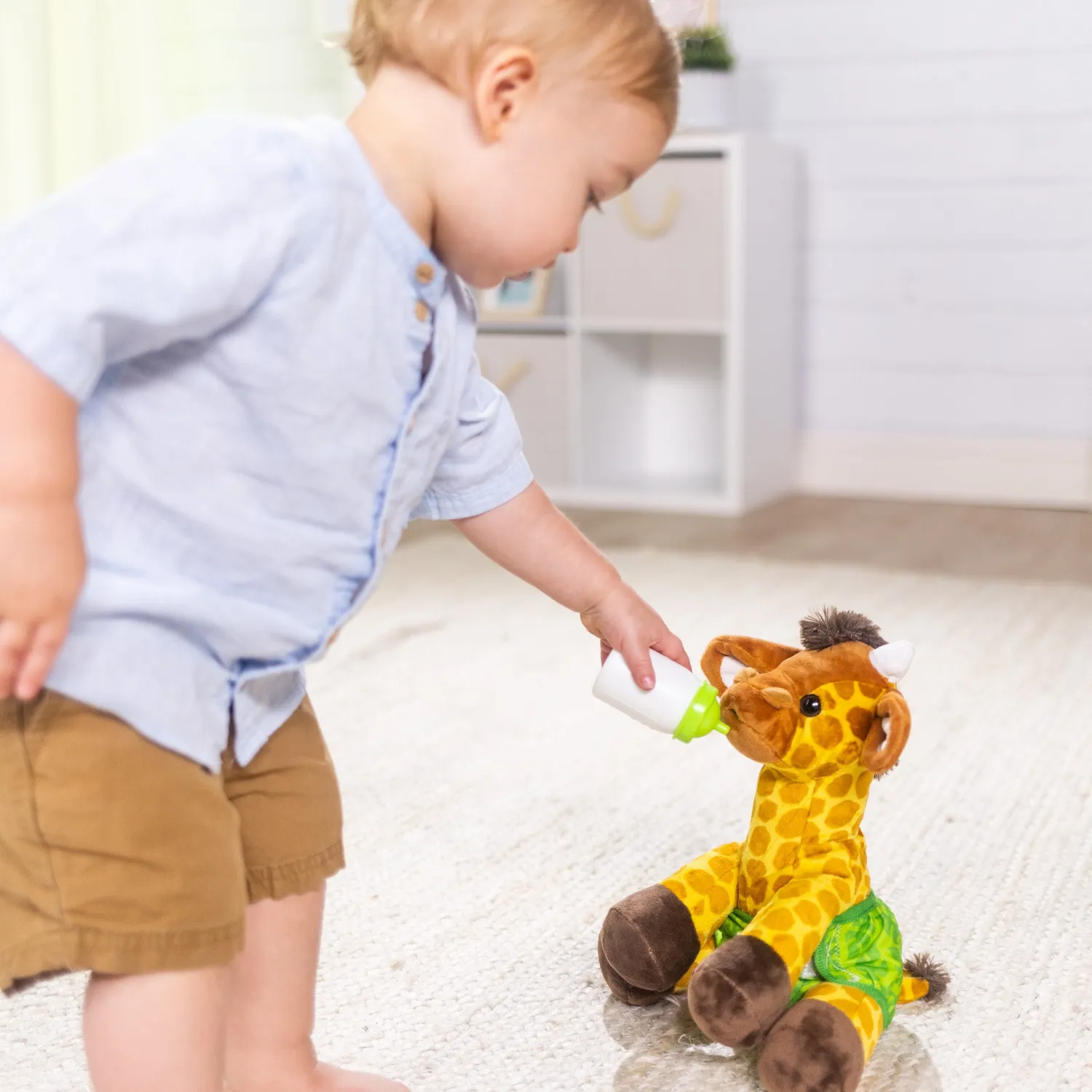 Melissa & Doug Baby Giraffe Kuscheltier mit Zubehör