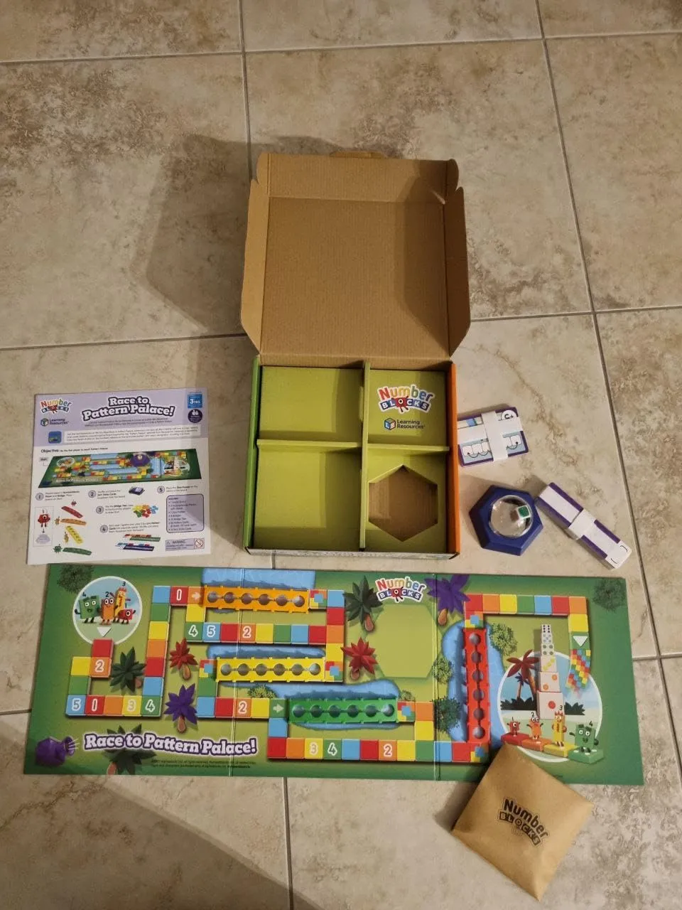 Learning Resources Numberblocks Wettlauf zum Musterpalast Brettspiel 91-teilig
