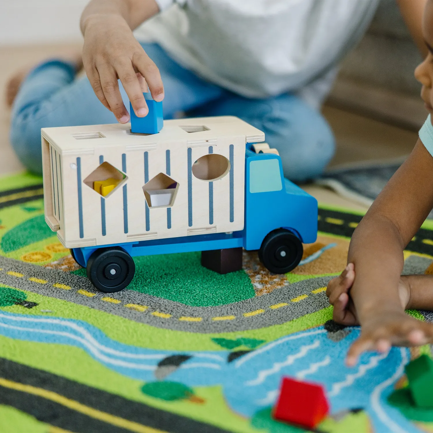 Melissa & Doug Shape-Sorting Dump Truck Kipplaster Holz