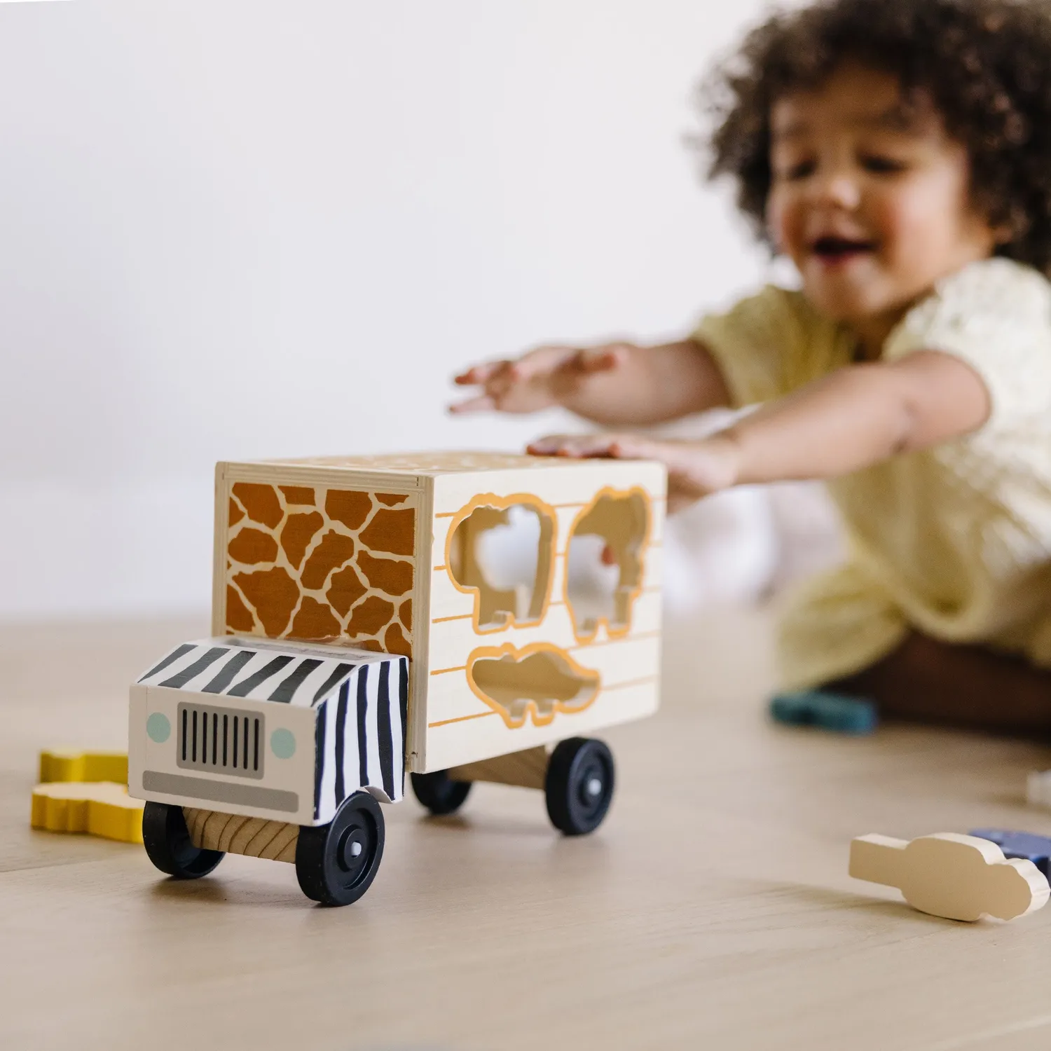 Melissa & Doug Animal Rescue Safaritruck Holz 9 Tiere stapelbar