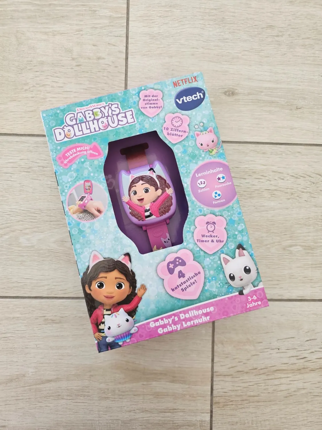 VTech Gabbys Dollhouse Lernuhr mit 4 Spielen und Stimme
