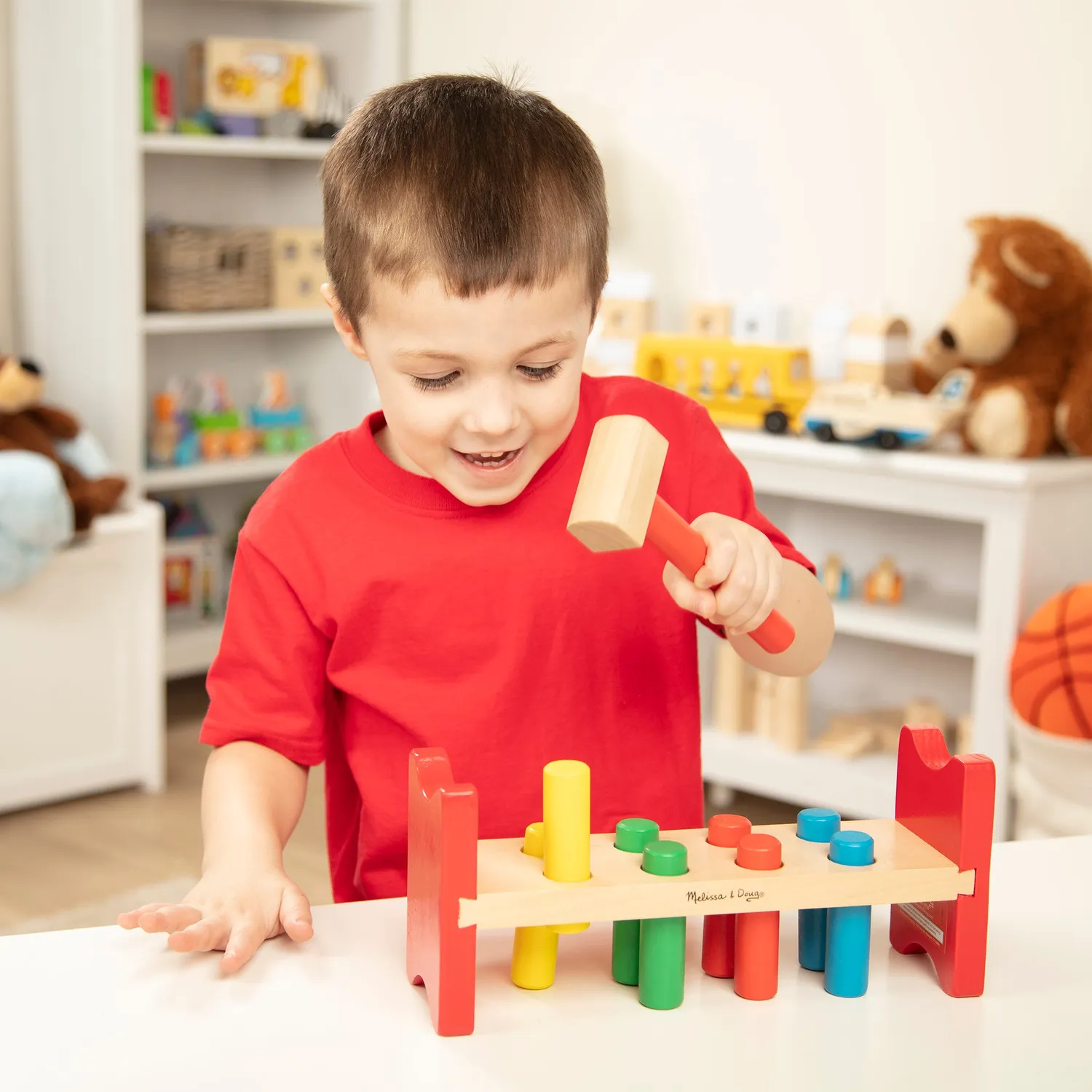 Melissa & Doug Pound-a-Peg Klopfbank Holz mit Hammer 8 Zapfen
