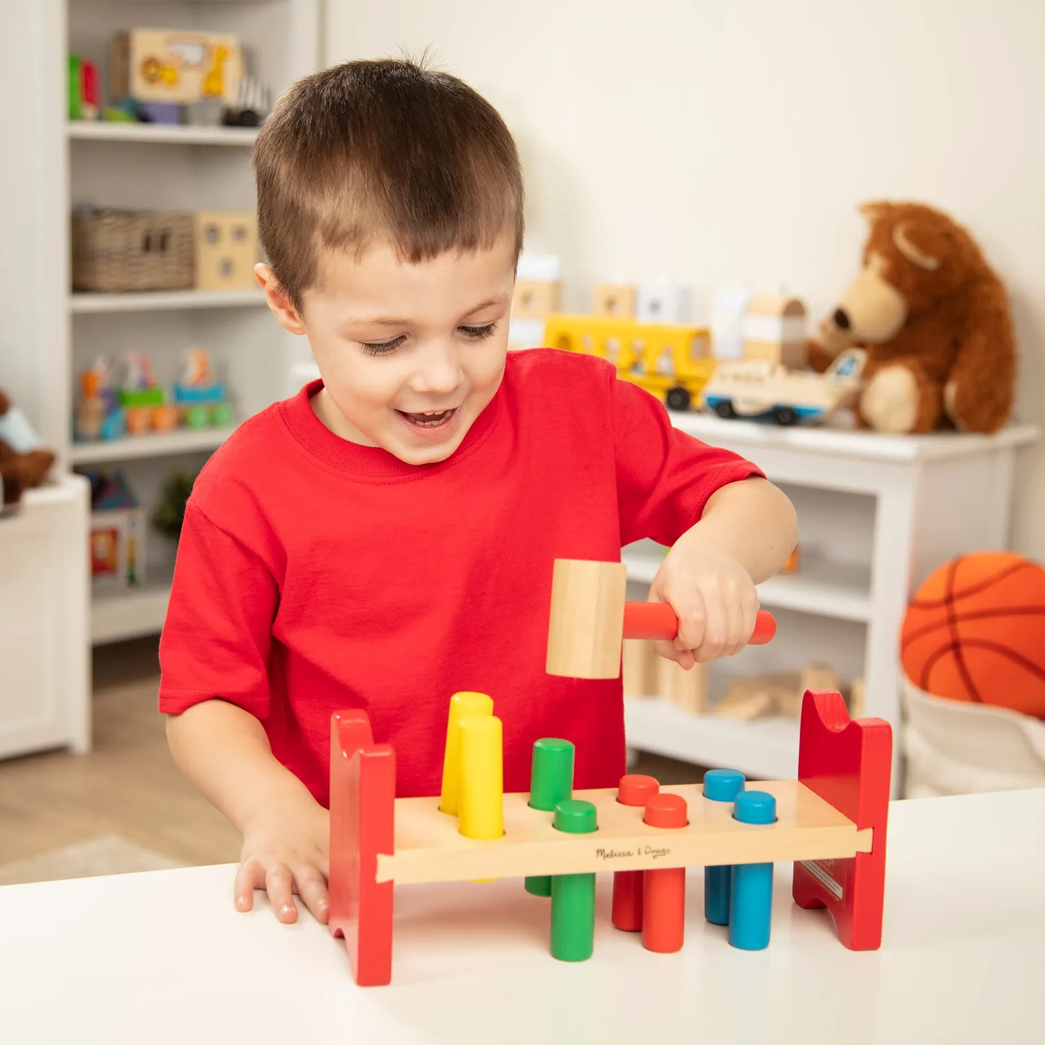 Melissa & Doug Pound-a-Peg Klopfbank Holz mit Hammer 8 Zapfen