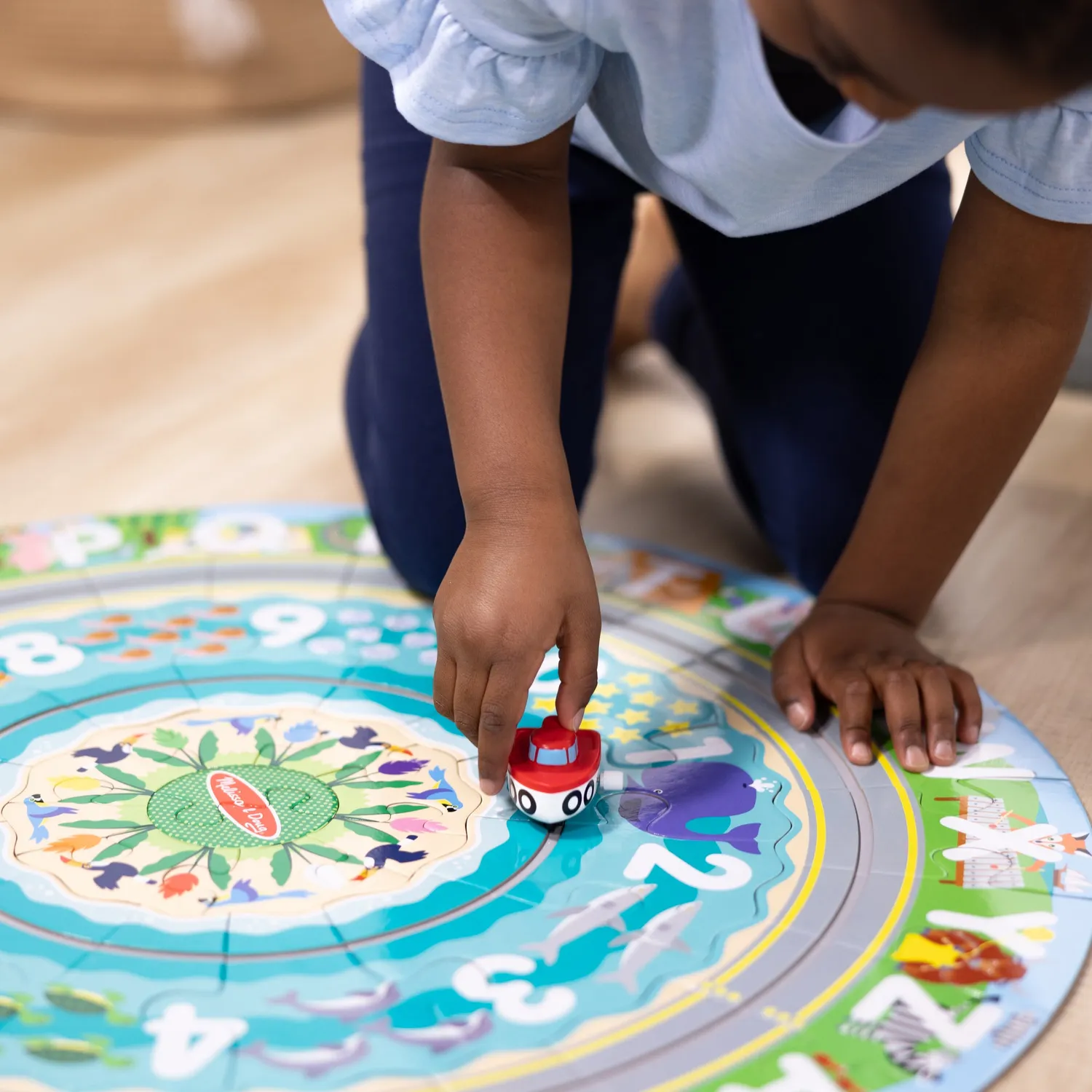 Melissa & Doug Round the Shore Tracks Bodenpuzzle 48 Teile rund