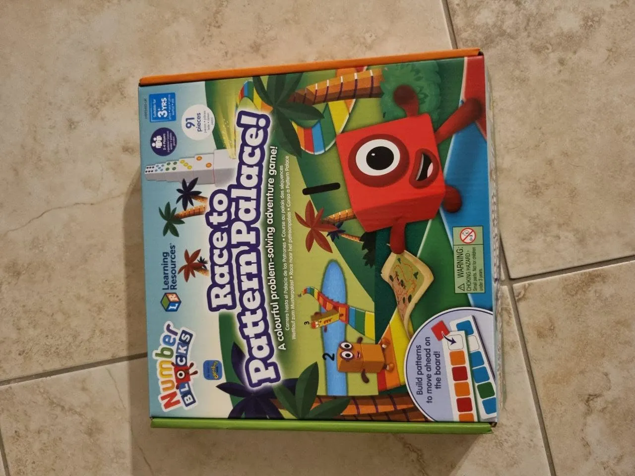 Learning Resources Numberblocks Wettlauf zum Musterpalast Brettspiel 91-teilig