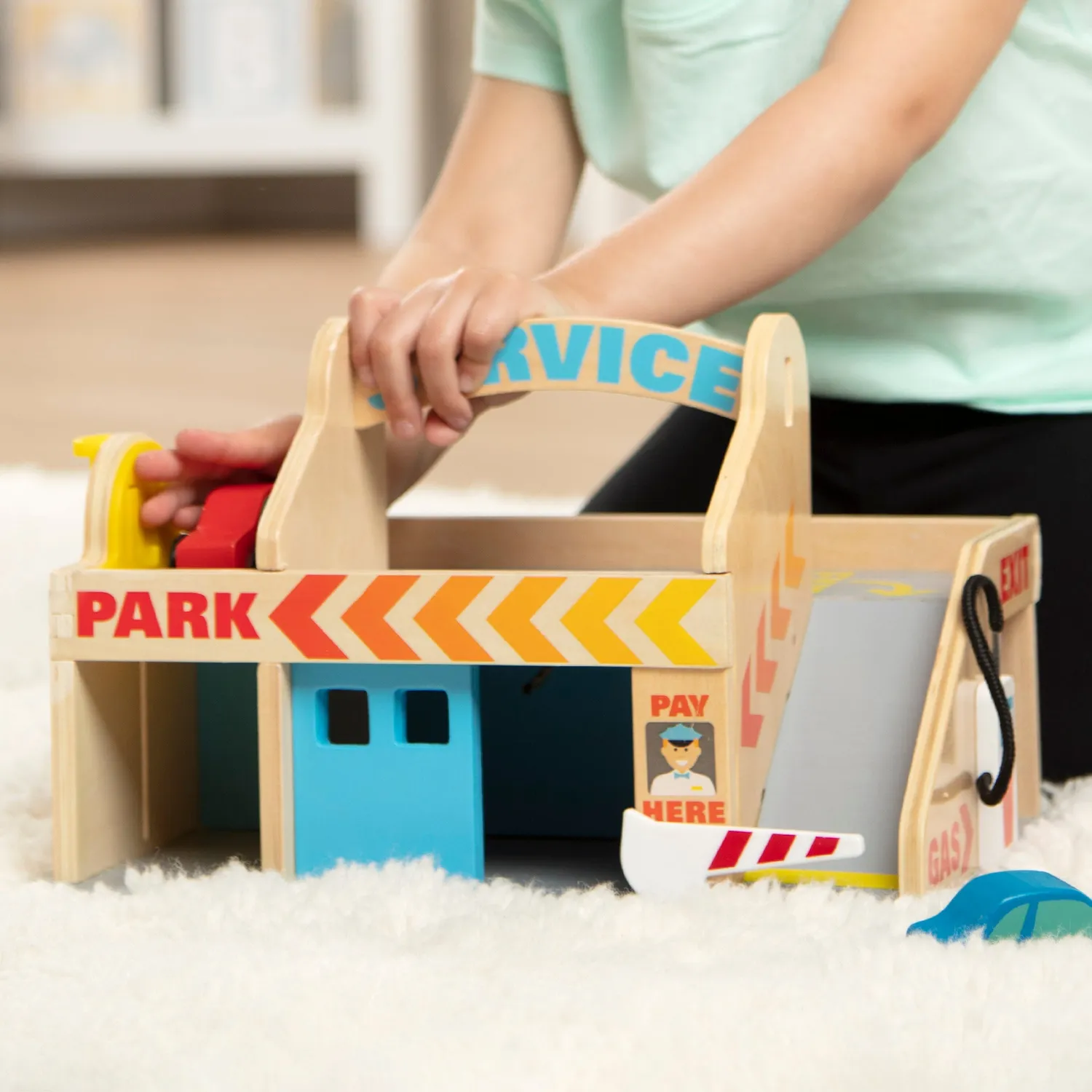 Melissa & Doug Service Station Parkhaus Holzspielzeug mit Autos