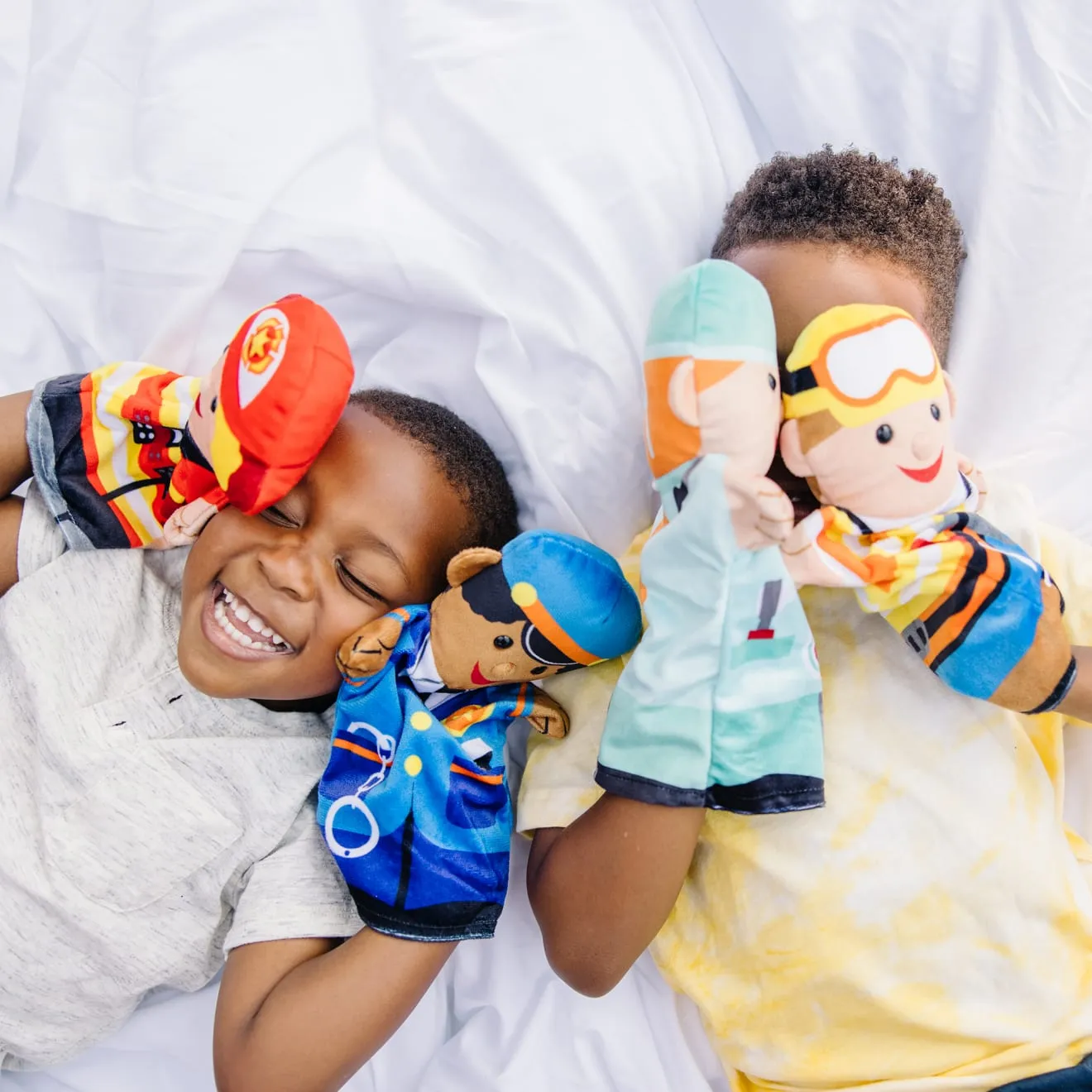 Melissa & Doug Jolly Helpers Handpuppen 4er Set Berufe Stoff
