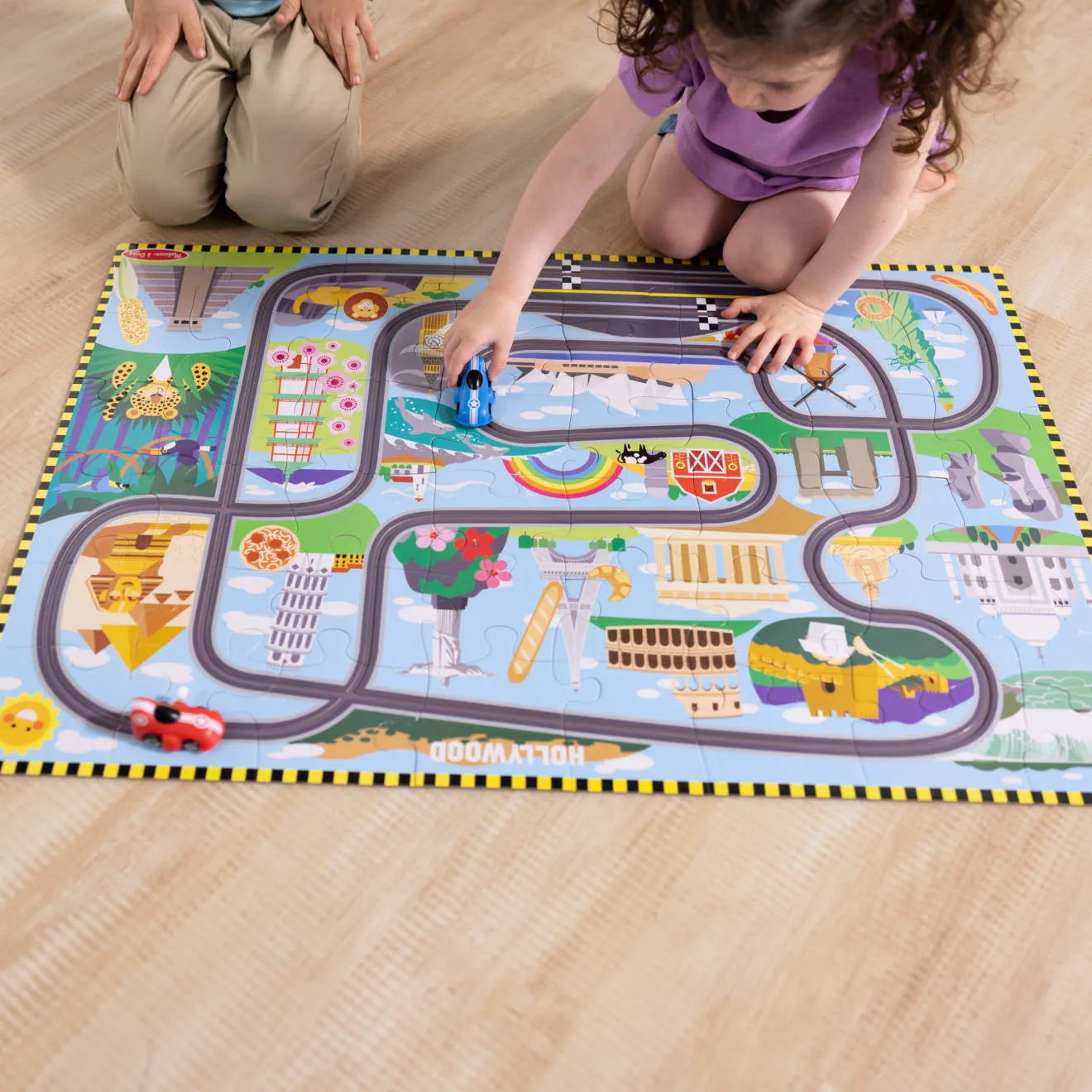 Melissa & Doug Race Around the World Bodenpuzzle 48 Teile Rennbahn