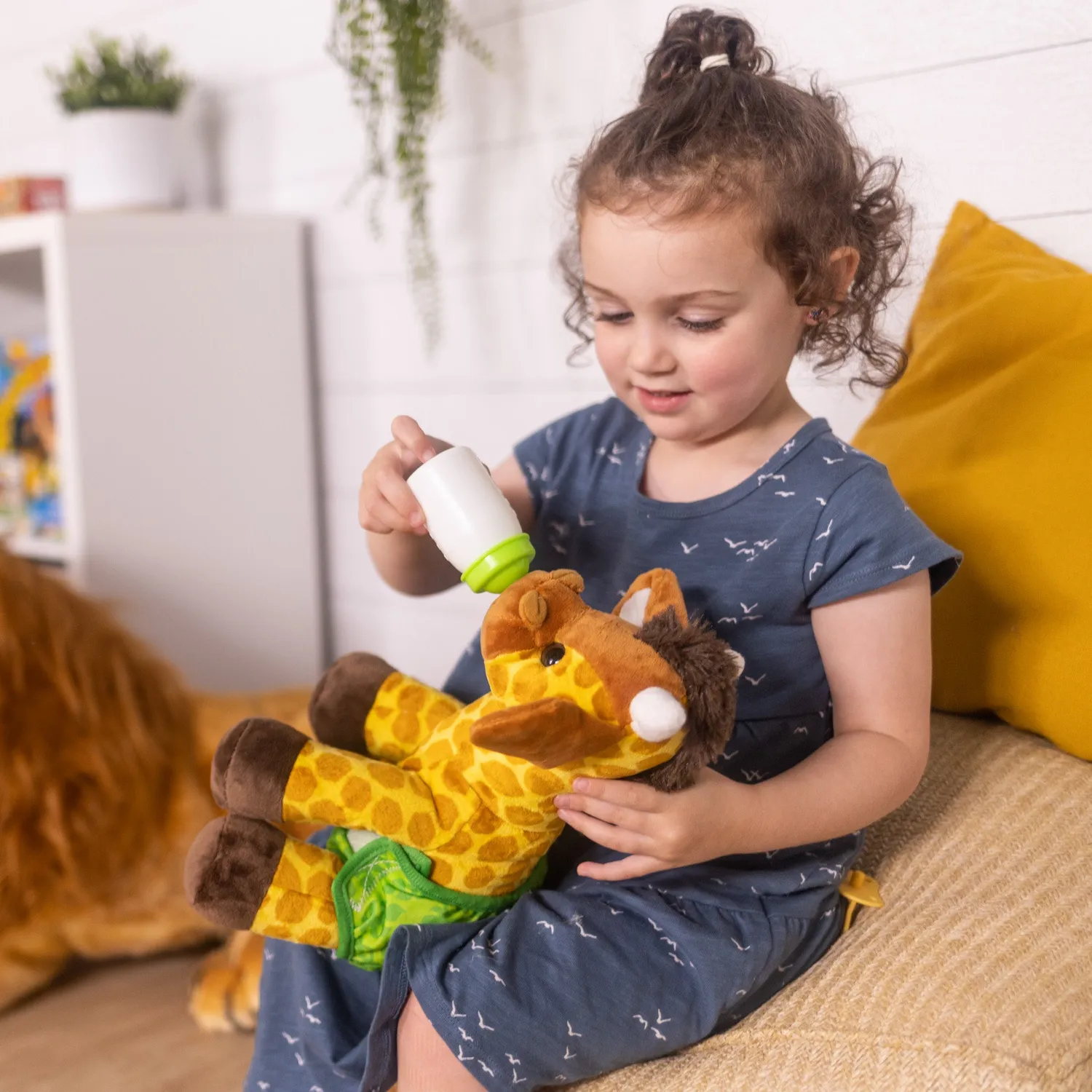 Melissa & Doug Baby Giraffe Kuscheltier mit Zubehör